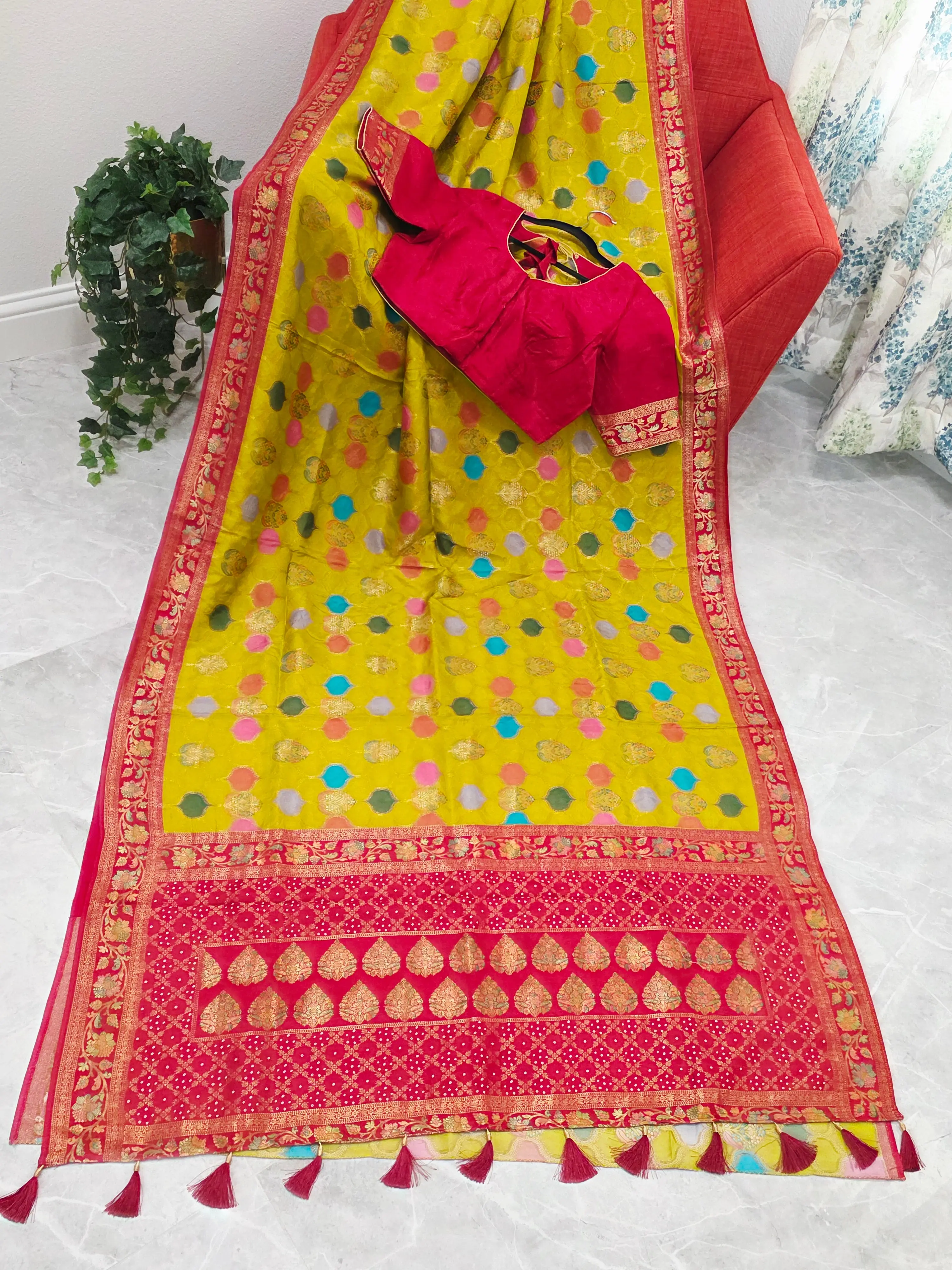 Benarasi Soft Silk Mustard Yellow Saree with Multicolor Butta & Red Zari Border - Stitched Blouse