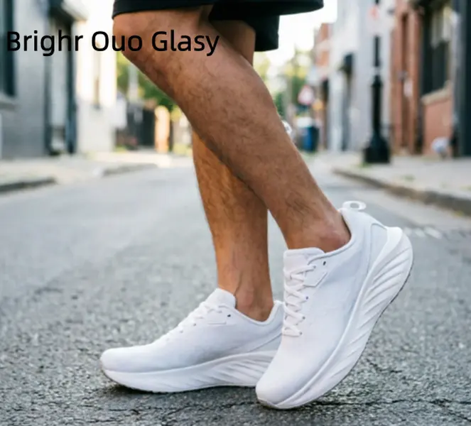 Sleek All-White Daily Training Athletic Trainers High Density Ventilated Stretch White Mesh Upper Durable Reinforced Rounded Toe Cap Ergonomic Wave Shaped White Cushion Midsole Full Surface Energy Rebound Responsive Foam Layer Multi-Directional Fine