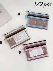 This new, minimalist double-layer transparent zipper mesh card holder offers clear visibility and is suitable for storing business cards, lipsticks, coins, and small items. It also makes a great passport organizer and a perfect Mother's Day gift.