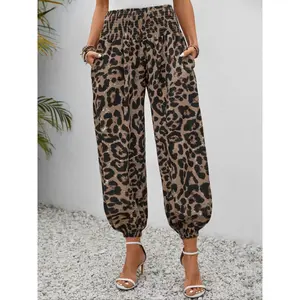 Women’s high-waisted leopard-print joggers, casual and fashionable pants for spring and autumn, featuring a loose fit and an elastic waistband