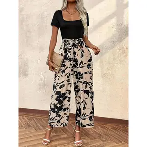 Women’s elegant casual square-neck short-sleeved top paired with a bohemian-print jumpsuit, suitable for beach vacations and activities. GARMENTARY