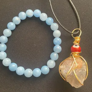 Smoky quartz wrapped in gold copper blue aquamarine