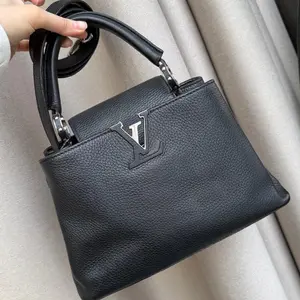 Pre-owned Louis Vuitton Capucines BB, black and silver with purple inner panels