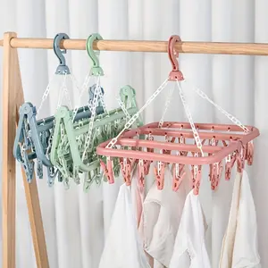 Rotatable Plastic Clothes Hanger with 32 Clips, Multifunctional Hanger, Space-saving Foldable Drying Rack, Suitable for Socks, Underwear, Ideal for Bedroom, Bathroom, Wardrobe and Dorm Storage, Laundry Accessories