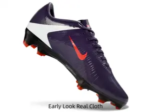 Glossy deep purple soccer cleats with white panels & fiery red accents, bold competitive style