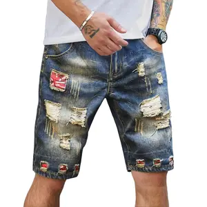 Men’s summer plus-size American vintage high-street denim shorts — washed distressed look, loose straight fit, mid-rise button closure, five-inch inseam, ripped details, color-block design; stylish and versatile