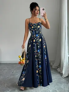 A fashionable women's navy blue floral print camisole dress with delicate floral print. The camisole design is off the shoulder and suitable for commuting to work, shopping, and outdoor wear