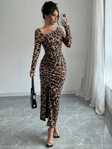 A women's leopard print V-neck long-sleeved slit dress with a bold style, perfect for a confident and stylish look.