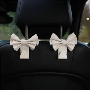 2 car mounted hooks, leather bow, car seat back, Car Seat Decorative, load-bearing storage hooks, fashionable goddess car accessories
