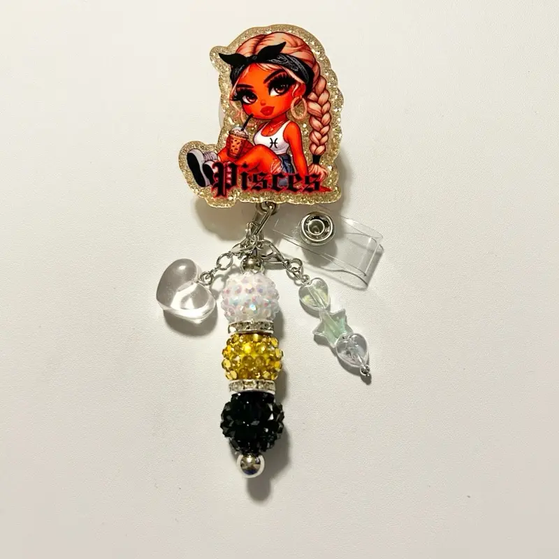 Pisces Charmed- Cute trendy retractable badge reel with alligator clip and colorful beads. Charms may vary from photo but will match colors in acrylic piece.