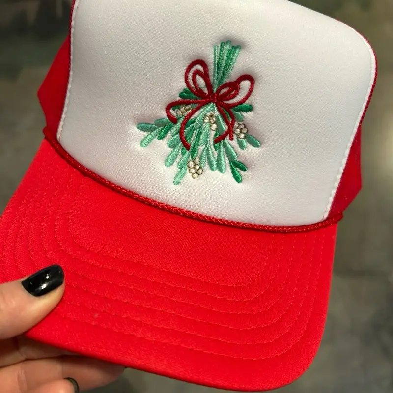 Under the Mistletoe Foam Trucker Hat - Red and White Christmas Design with Embroidered Mistletoe and Bow