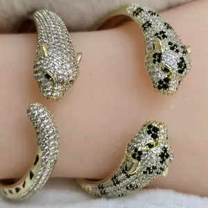 # 0124 Bracelete open size estilo pantera adiamantadas oro laminado 14k Alta calidad