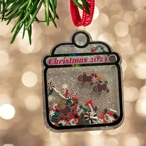 Cookie jar badge reel or ornament. Gingerbread man sprinkles and candies. Santa’s cookies