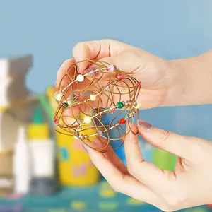 Creative and novel stress-relief magic wire basket toy, nostalgic stress-relief steel ring toy for adults and children, small gift