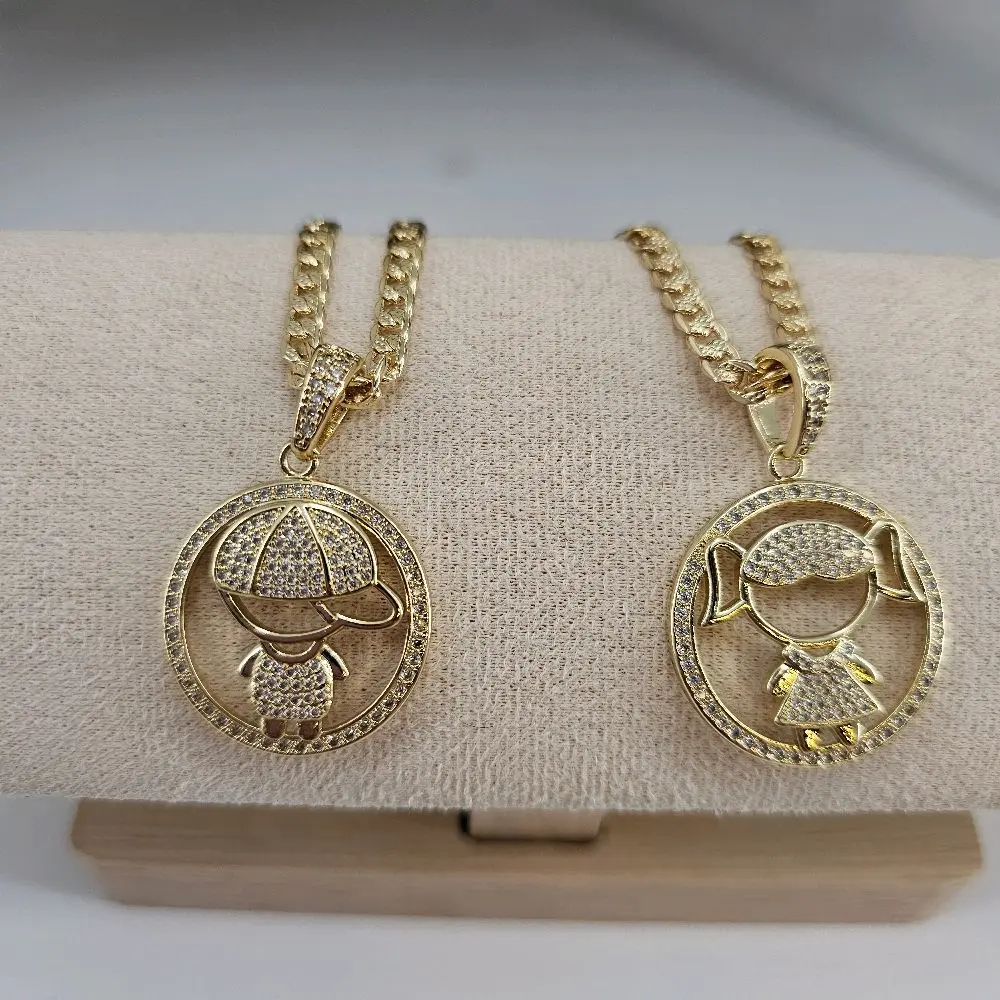 (84) 14K GoldLaminated  Girl or Boy pendant with chain.