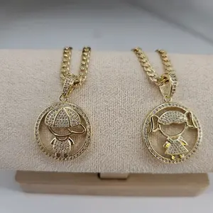 (84) 14K GoldLaminated  Girl or Boy pendant with chain.