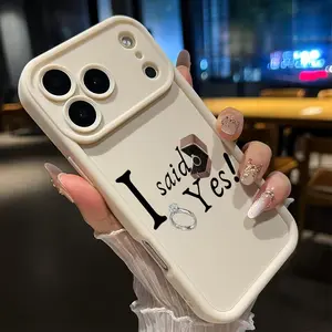 Confession Moment: "I Said Yes" diamond ring motif, shockproof and anti-slip TPU full-coverage lens phone case, suitable for iPhone 17, 16, 15, 14, 13, 12, 11, XS, X and other series models, a perfect Valentine's Day gift for your loved one.