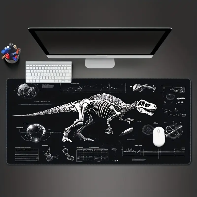 One Oversized Gaming Desk Mat Featuring a Dinosaur and Technology Theme, Combining Functions as Both a Computer Keyboard and Mouse Pad. It Has a Non-slip Rubber Base, with a Black and White Surface Adorned with Dinosaur Skeletons and Technological