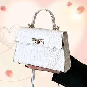 Elegant White -Textured Handbag with Gold Hardware and Secure Locking Mechanism