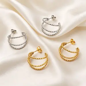 Fashionable and popular stainless steel earrings for women, high-end luxury twisted C-shaped titanium steel stud earrings
