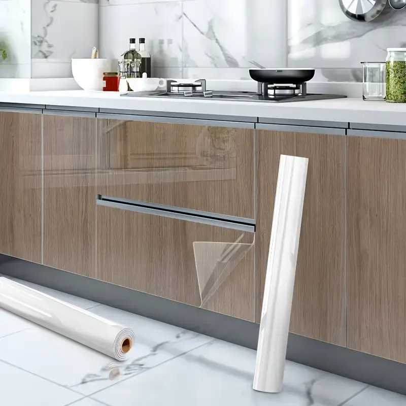 One roll[23.62*393.70 in]1 roll of self-adhesive transparent kitchen wall sticker - oil resistant, high temperature resistant, waterproof, easy to peel and clean vinyl protective film, suitable for stoves, cabinets, living rooms, wall protection film