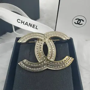 Pre-owned Chanel Classic Logo Gold Brass with Crystal Embellishment Brooch 1108GIA0030