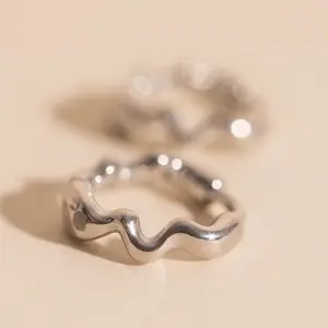 Squiggly Rounded Huggie Hoop Earrings Squiggly Rounded Huggie Hoop Earrings