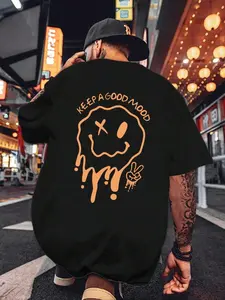 "Keep A Good Mood" Dripping Smiley Face Graphic T-Shirt, Vintage Melting Happy Face Print Oversized Crew Neck Tee, Unisex Short Sleeve Streetwear Cotton Top, Trendy Y2K Aesthetic Shirt for Streetwear Lovers, Mood Boost Fans and Casual Outfit Enthusiasts