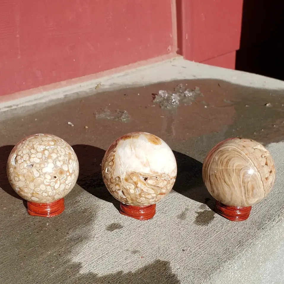 Natural polished Amber Calcite sphere
