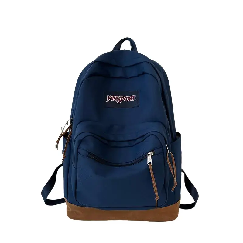 JanSport Navy Blue Suede Series Backpack – High-Capacity School Bag for Students (Unisex), Suitable for Travel and Outdoor Use