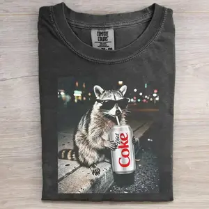 Three Raccoons Diet Coke Comfort Colors T-Shirt/ Gildan Tee with a funny Gen Z dank meme vibe, trendy cotton streetwear top and playful graphic gift for men and women alike.