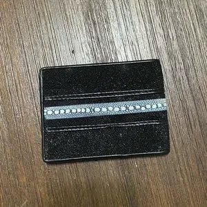 Cartera de mantarraya embra