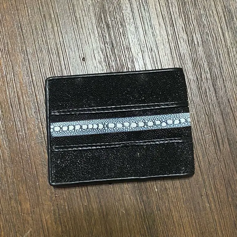 Cartera de mantarraya embra