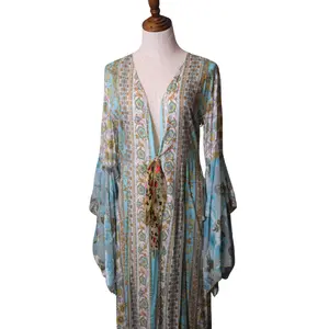 Elegant Sky-Blue Italian Dress with Butterfly Sleeves and Intricate Patterns