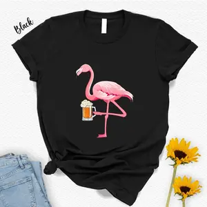 Men's flamingo drinking beer Graphic T-Shirt - Short Sleeve Crew Neck Regular Fit Casual Wear | Soft & Breathable Fabric, Durable Print, Everyday Comfort, Machine Washable, casual and humorous flat lay with jeans and sunflowers, suggesting a relaxed, fun