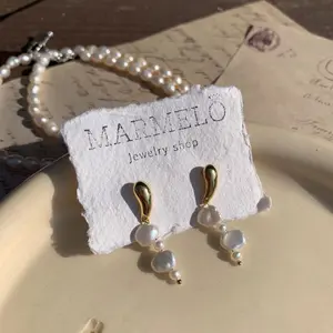 Amelia's Unique Tiered Pearl Drop Earrings