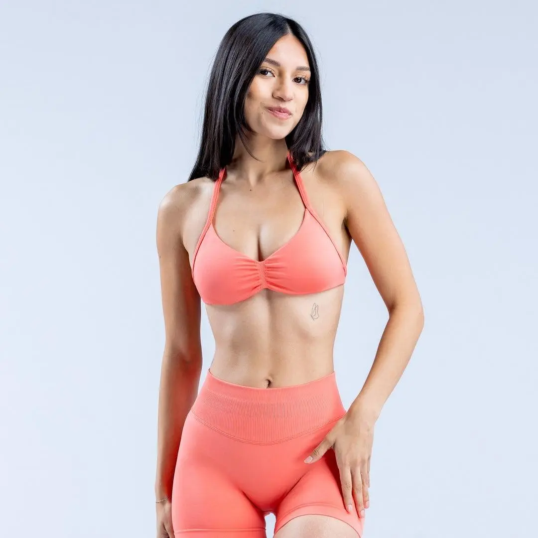 Impact Strappy Bra & Shorts Set logo - Sleek and Supportive Activewear in Plain Coral Color for Women