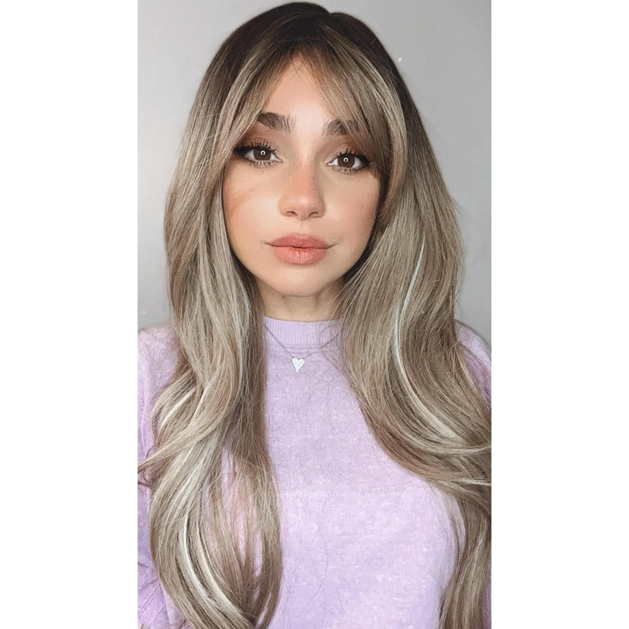 EllaRae | Olivia Style Wig | Loose Wavy Ash Blonde with Highlights and Curtain Bangs