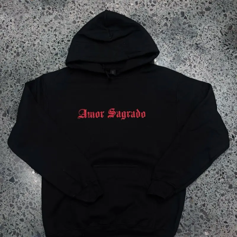 “Amor sagrado” sacred heart hoodie with red glitter design “Amor sagrado” sacred heart hoodie with red glitter design