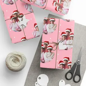 Sturniolo Triplets Wrapping Papers with Festive Pink Design and Santa Hats for Christmas Gifts