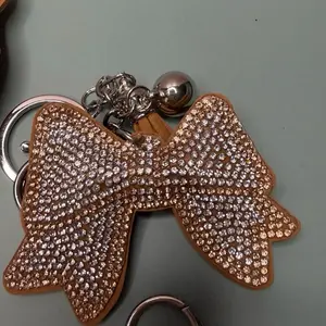 Gold outline silver bow keychain