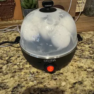 OSTBA Egg Cooker 7-Egg Electric Boiler with Manual Switch Overheat Protection Mini Food Steamer for Soft Medium & Hard Eggs Easy to Clean Portable Black Multi-Function