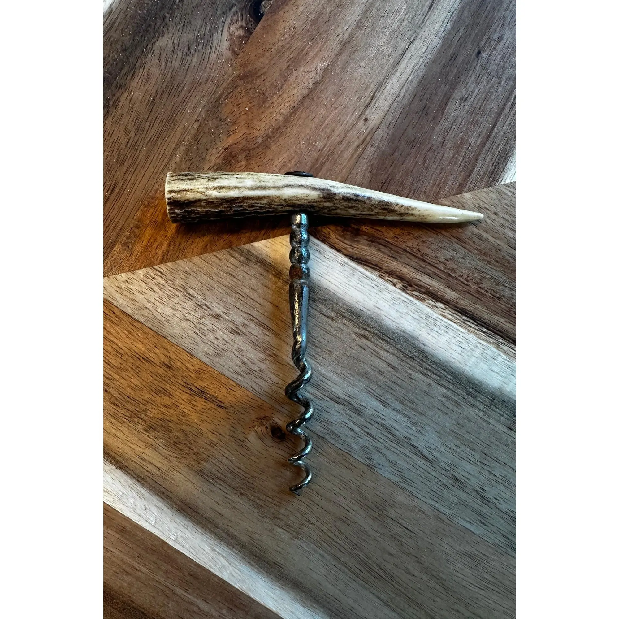Vintage horn-handled corkscrew with steel worm