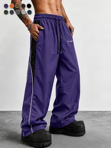 Men's contrasting color reflective strip wide-leg casual pants, pendant smooth fabric, side stripes, American high street style, daily commuting adaptation, trendy and versatile personality
