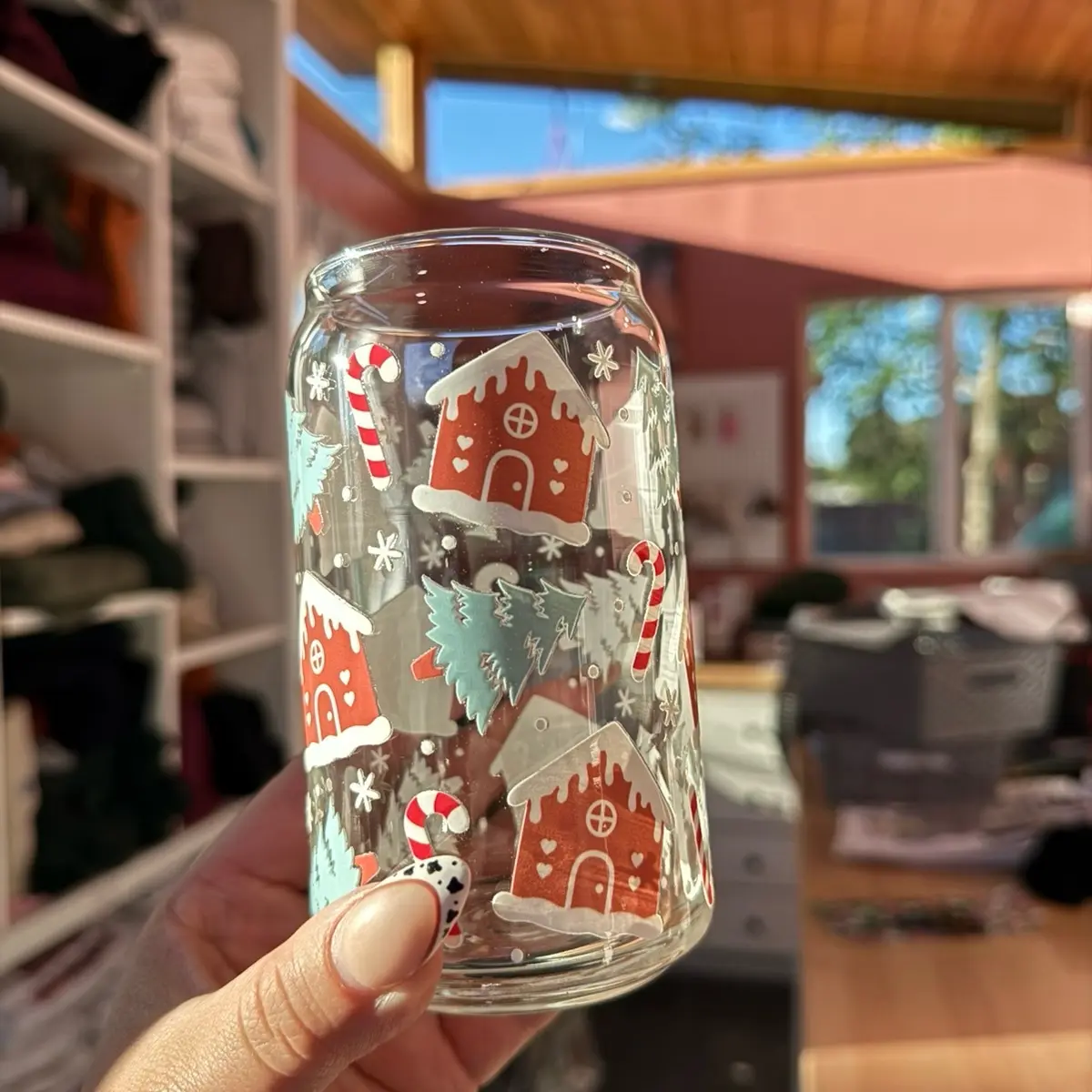 Gingerbread Christmas Glass Cup with Lid, Decorative Design, Featuring Gingerbread Houses and Candy Cane Accents