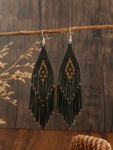 A pair of retro Bohemian style classic black charm rice bead layering design long tassel pendant hand-woven beaded earrings, Boho Jewelry, Trendy Jewelry, suitable for ladies to wear at daily parties, versatile, perfect gift for lovers and sisters