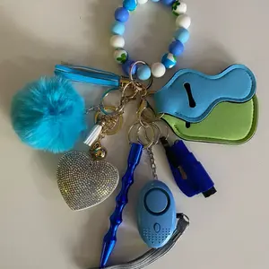 8 Piece Keychain Accessory Set with Beaded Bracelet Heart Charm Fuzzy Pom Pom