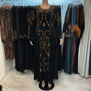 black velvet dress with string rhinestone design and pockets