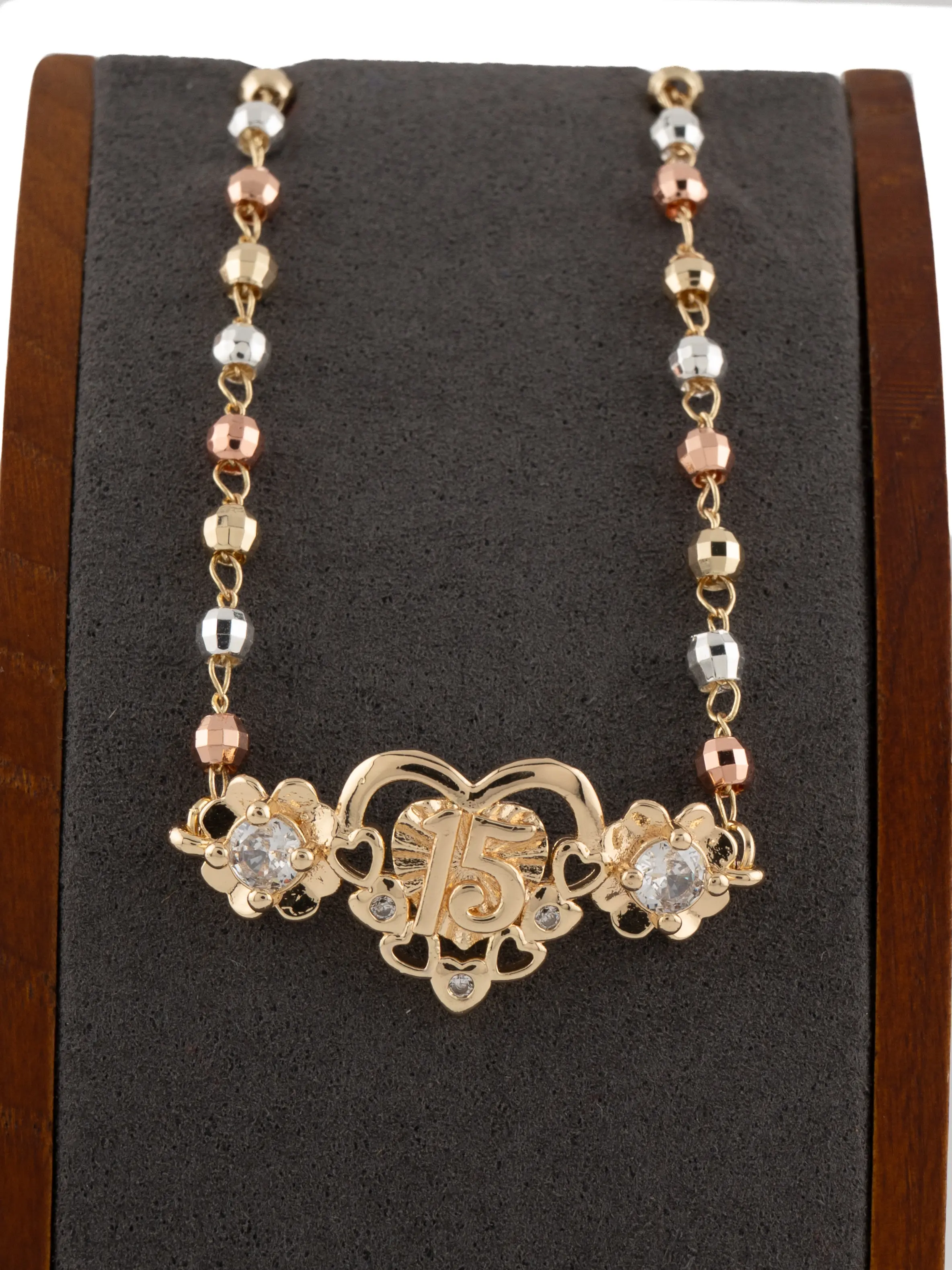 New 7.5-inch Quinceañera Bracelet in Three-Tone Gold Overlay
