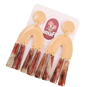 Arco Polymer Clay Dangle Earrings in Sand with Clear and Red Marble Accents